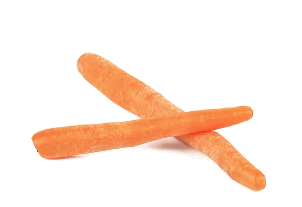 Dwa świeże marchewki krzyż — Zdjęcie stockowe