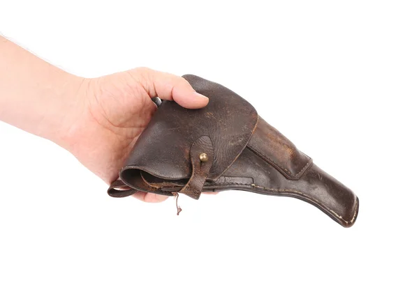 Hand holds old brown holster — Stock Photo, Image