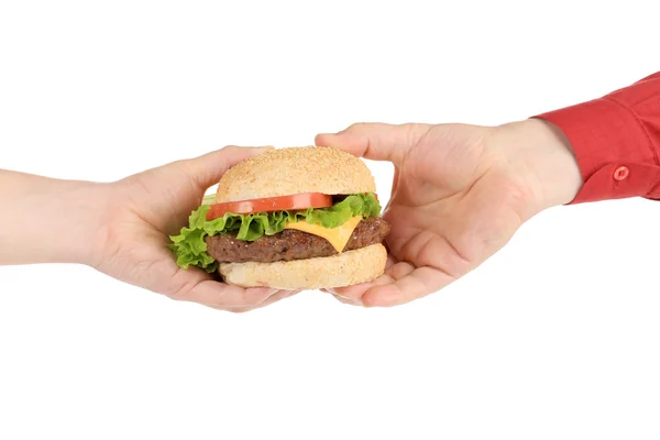 Big hamburger in hand — Stock Photo, Image