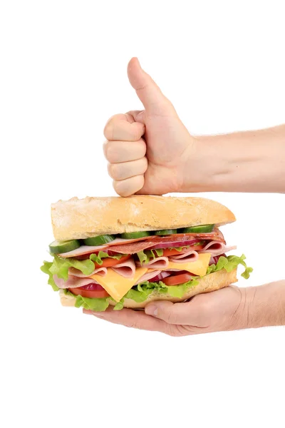 Mano tiene sandwich — Foto Stock