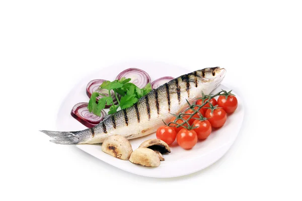 Grilled seabass on plate with tomatoes — Stock Photo, Image