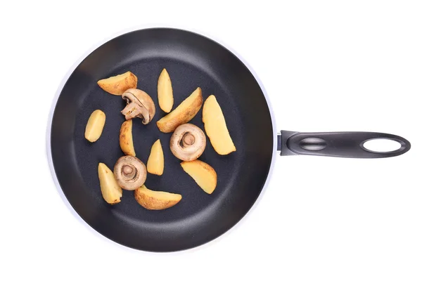 Frying pan with potatoes and mushrooms — Stock Photo, Image