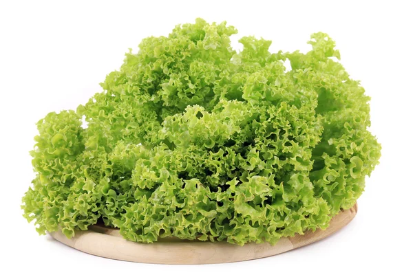Fresh lettuce on wooden platter — Stock Photo, Image