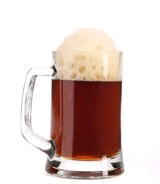 Tall big mug of brown beer with foam — Stock Photo, Image