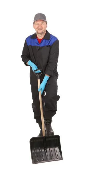 Man holds black shovel. — Stock Photo, Image
