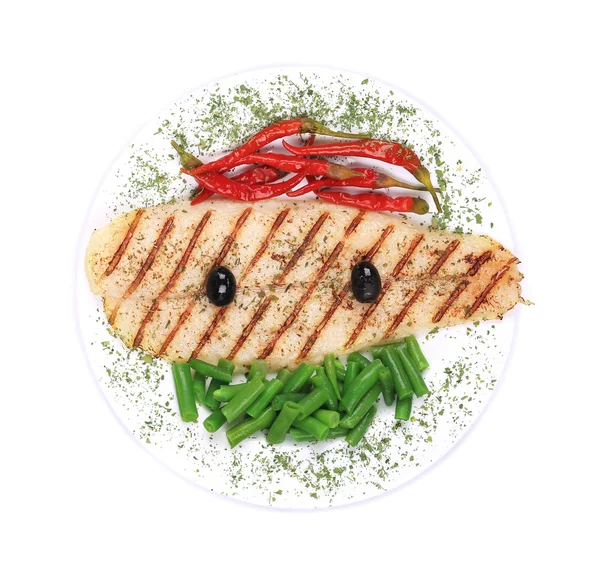 Grilled pangasius fillet on plate — Stock Photo, Image