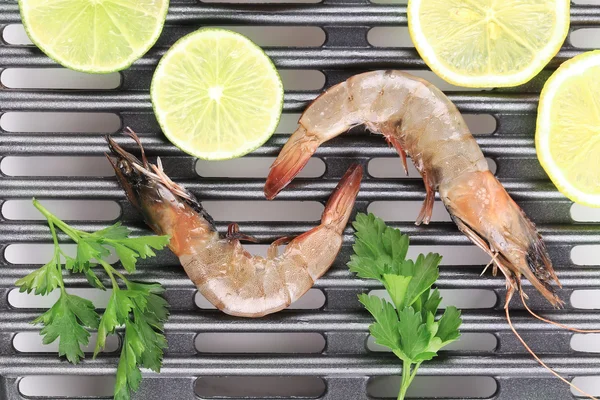 Shrimps on a grill — Stock Photo, Image