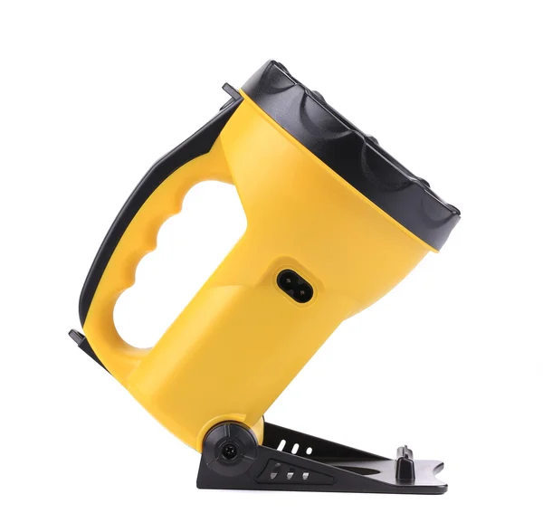 Yellow plastic flashlight — Stock Photo, Image