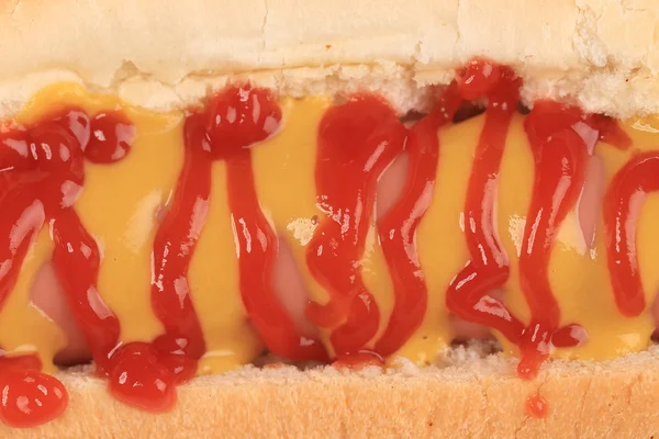 Hotdog with mustard and ketchup — Stock Photo, Image