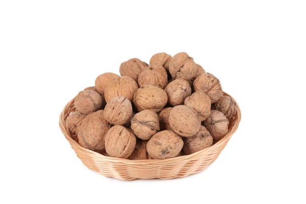 Ořechy v proutěném koši — Stock fotografie