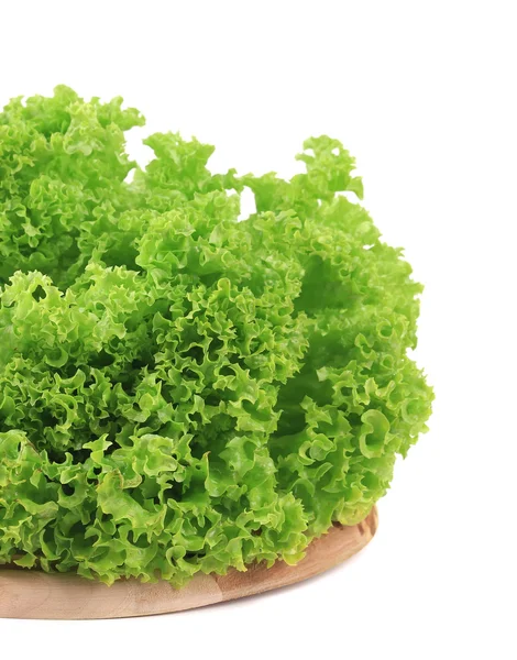 Verse groene salade op houten bord — Stockfoto