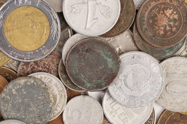 Varias monedas y un oro —  Fotos de Stock