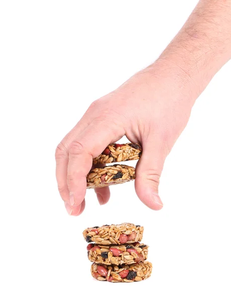 Peanuts and sunflower seeds in hand — Stock Photo, Image