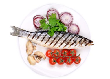 Grilled fish with vegetables. clipart