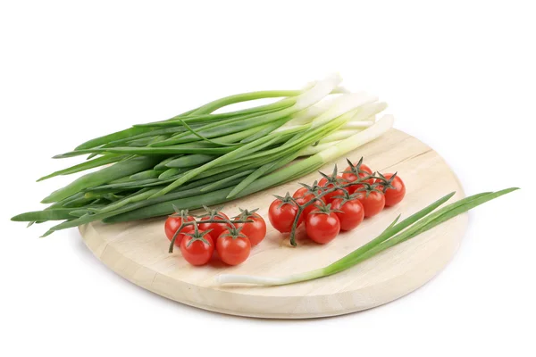 Onions and cherry tomatoes. — Stock Photo, Image