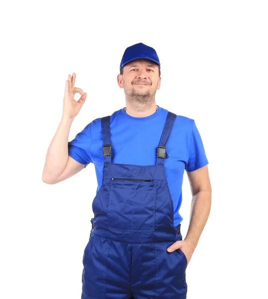 Man in blue overalls — Stock Photo, Image