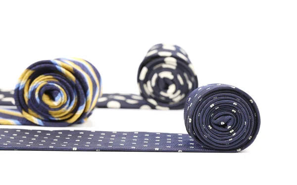 Three rolled multi-colored tie — Stock Photo, Image
