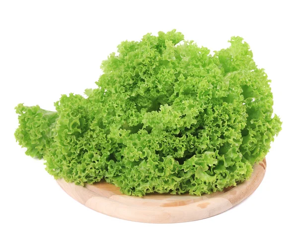 Fresh lettuce on wooden platter. — Stock Photo, Image