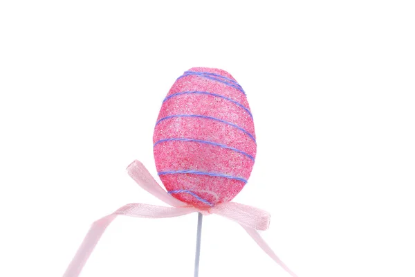 Easter egg on wooden stick. — Stock Photo, Image