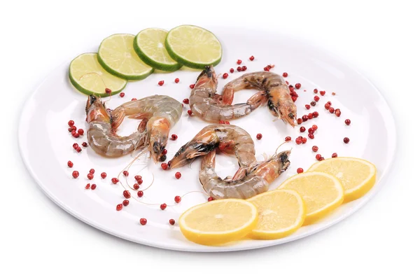 Raw shrimps on plate. — Stock Photo, Image