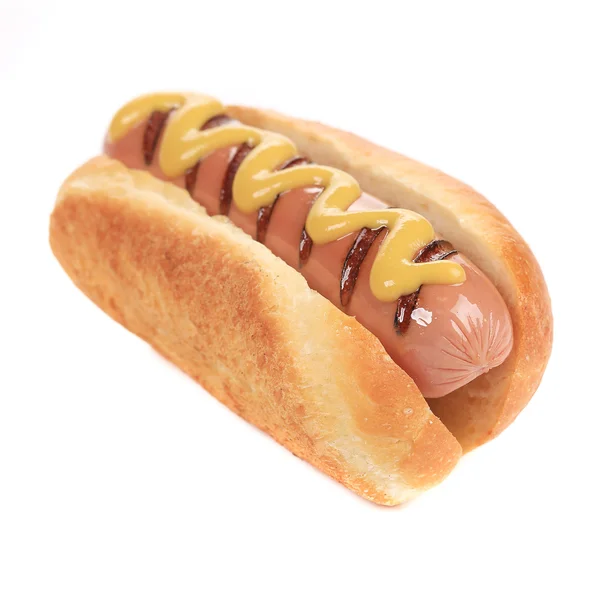 Lekkere gegrilde hotdog met mosterd. — Stockfoto