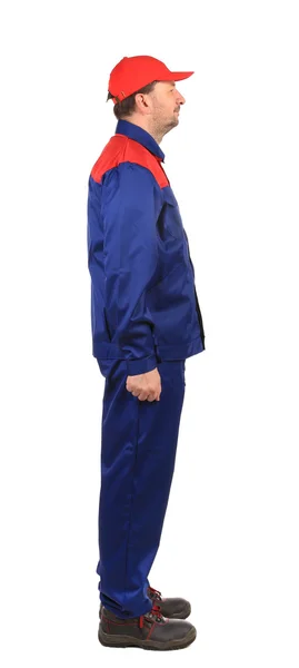 Homem de macacão azul e vermelho — Fotografia de Stock
