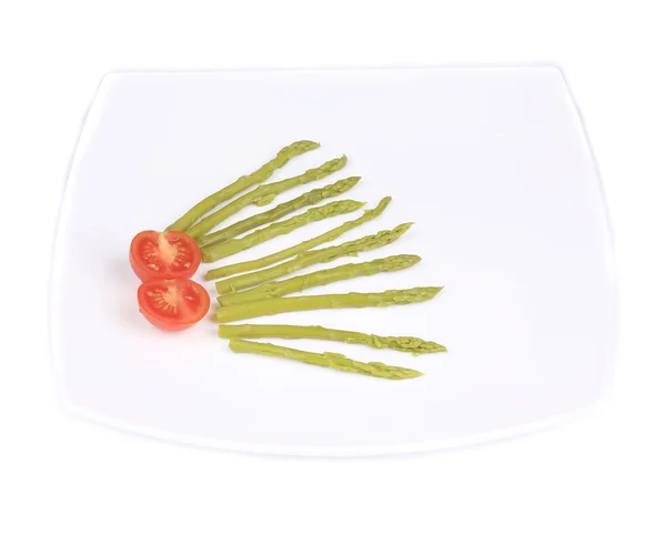 Groene asperges en cherry tomaten — Stockfoto