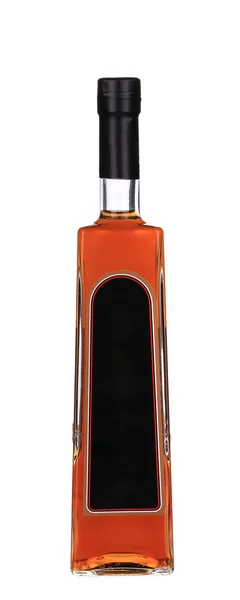 Cognac fles op witte achtergrond. — Stockfoto