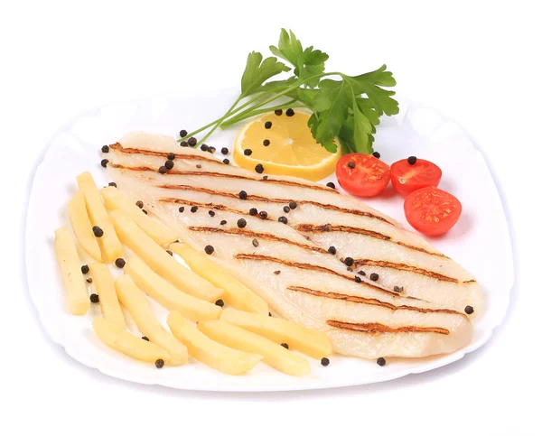 Grilled pangasius steak with vegetables. — Stock Photo, Image