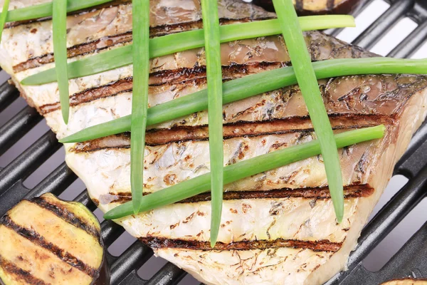 Grilled carp fillet on grill with egg plant. — Stock Photo, Image