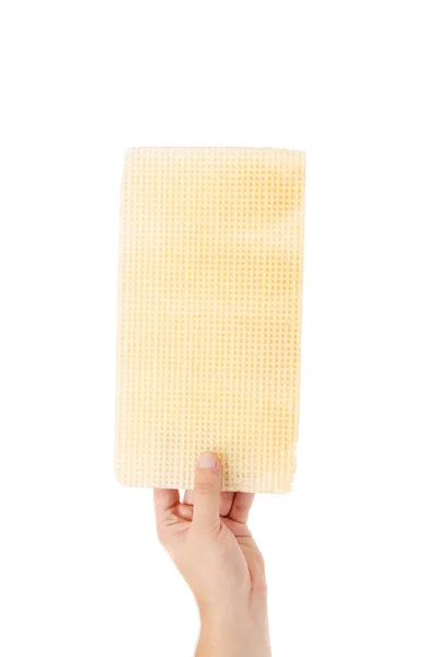 Hand holds wafers — Stock Photo, Image