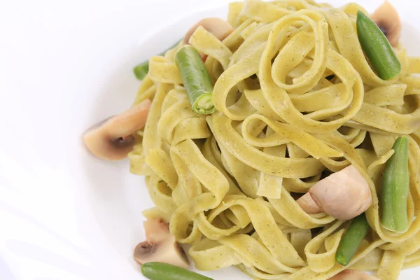 Pasta con champiñones y frijol francés . — Foto de Stock