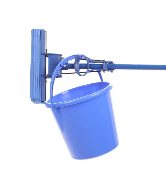 Blue broom and plastic basket. — Stock Photo, Image