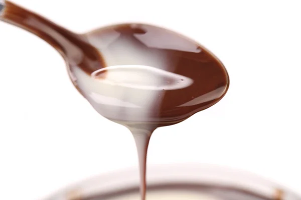 液体チョコレートをスプーン — ストック写真