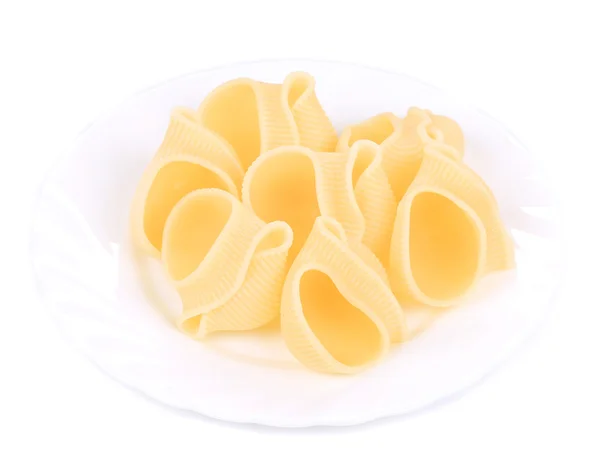 Italian pasta shells on a white plate — Stock Photo, Image