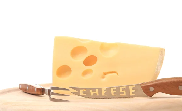 Cheese with fork and knife — Stock Photo, Image