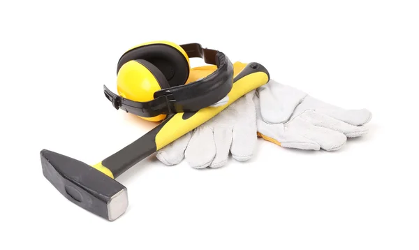 Protecteurs d'oreilles, marteau et gants . — Photo