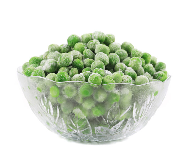 Ледяной зеленый горох в стеклянной чаше
.