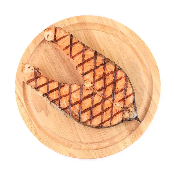 Grilled salmon steak on platter. — Stock Photo, Image