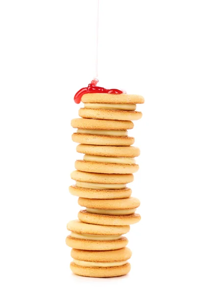 Stack of biscuits covered cherry jam. — Stock Photo, Image