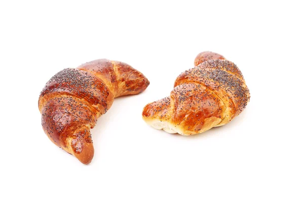 Croissants saborosos com papoula . — Fotografia de Stock