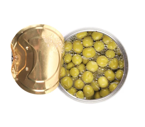 Tin can with green peas. — Stock Photo, Image