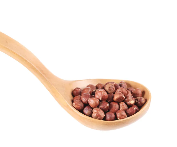 Spoon with hazelnuts. — Stock Photo, Image