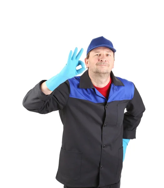 Hombre con guantes azules muestran señal de ok . —  Fotos de Stock