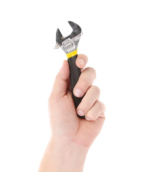 Adjustable wrench in a man's hand. — Stock Photo, Image