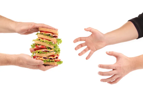 Hands with big sandwich. — Stock Photo, Image