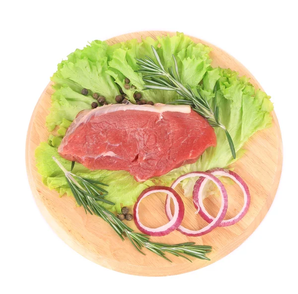 Raw beef steak on platter. — Stock Photo, Image