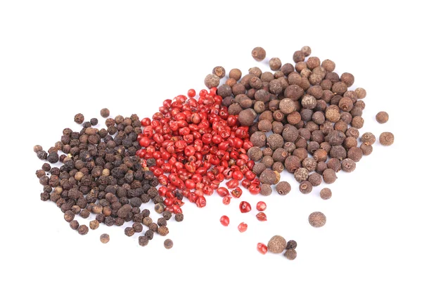 Vários grãos de pimenta . — Fotografia de Stock