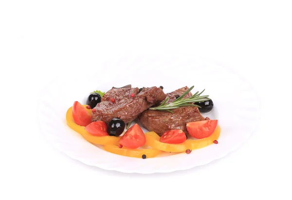 Beef steaks with rosemary and tomatoes. — Stock Photo, Image