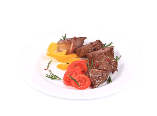 Beefsteaks with tomatoes and rosemary. — Stock Photo, Image